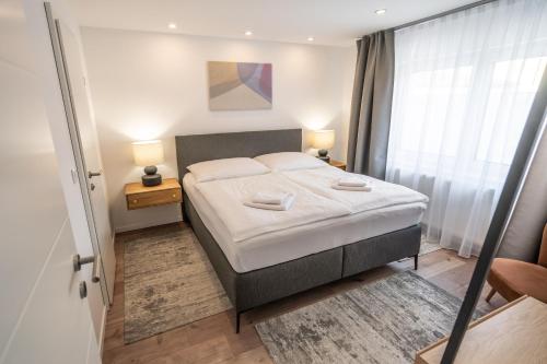 Postel nebo postele na pokoji v ubytování Pura Vida House – Bükfürdő