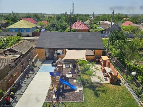 an aerial view of a house with a backyard at Casuta Noastra - Sulina in Sulina
