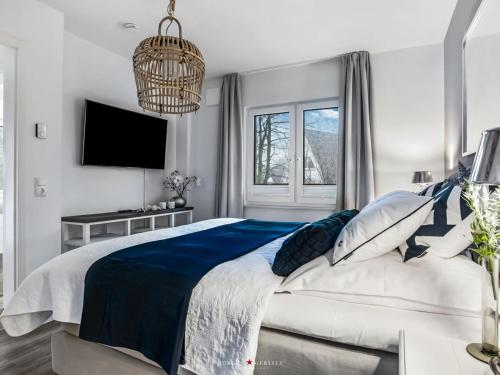 Postel nebo postele na pokoji v ubytování Ferienwohnung Ostseenest Damp