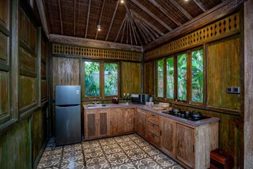 Η κουζίνα ή μικρή κουζίνα στο Arya Villas Ubud