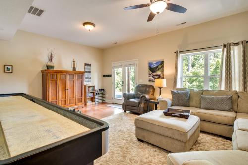 a living room with a pool table at Blue Ridge Mountain Home with Sunroom Pets Welcome in Fairview