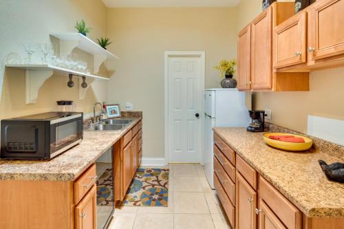a kitchen with a sink and a microwave at Blue Ridge Mountain Home with Sunroom Pets Welcome in Fairview