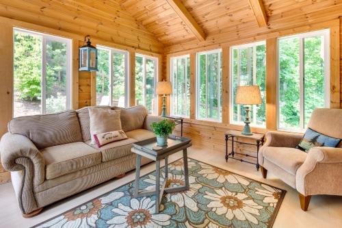 a living room with a couch and two chairs at Blue Ridge Mountain Home with Sunroom Pets Welcome in Fairview
