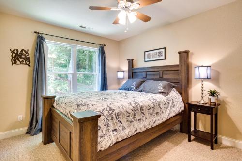 a bedroom with a bed and a window at Blue Ridge Mountain Home with Sunroom Pets Welcome in Fairview