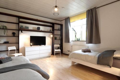 Katil atau katil-katil dalam bilik di Nice Apartment with balcony in Kierspe