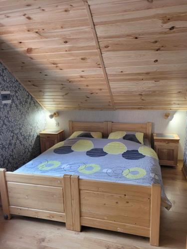 Postel nebo postele na pokoji v ubytování Gosciniec Pod Brzegiem