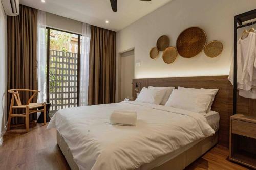 Ένα ή περισσότερα κρεβάτια σε δωμάτιο στο SUARASA Villa 1 - Private Pool