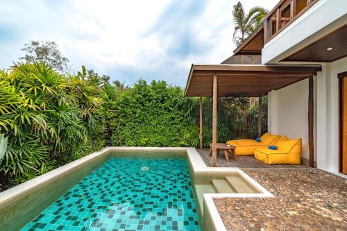 a pool in the backyard of a house at Tinkerbell Resort @ Koh Kood in Ko Kood