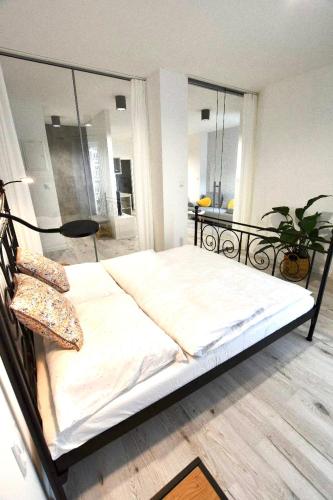 Ένα ή περισσότερα κρεβάτια σε δωμάτιο στο Apartament w sercu Bielska 4os