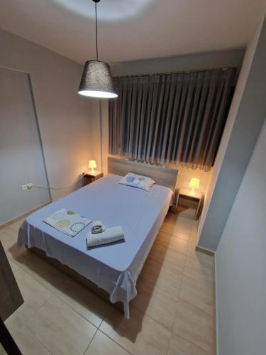 Ένα ή περισσότερα κρεβάτια σε δωμάτιο στο LUX groundfloor apartment in coastal N.Michaniona