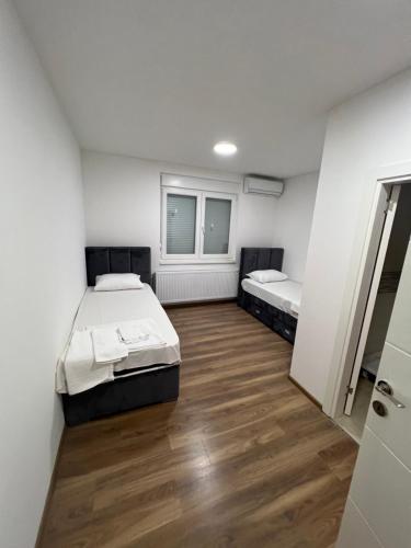 Voodi või voodid majutusasutuse Big House toas