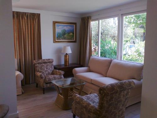 Posezení v ubytování Hotel Villa Singala