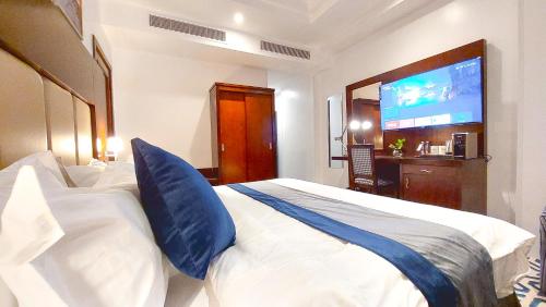 Katil atau katil-katil dalam bilik di Golden Dune Residential Unit - Almalaz