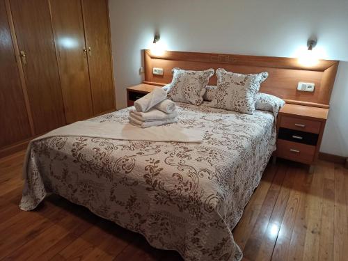 Postel nebo postele na pokoji v ubytování Casa Condesa de Albarei