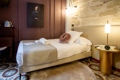 Postel nebo postele na pokoji v ubytování Les Monges Palace Boutique