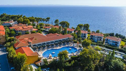 an aerial view of a resort with a swimming pool at Acrotel Athena Pallas in Elia