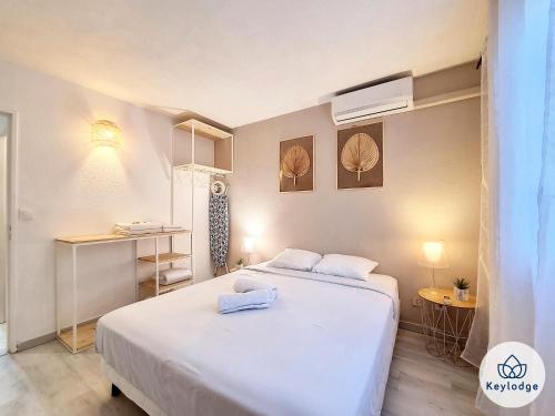 Postel nebo postele na pokoji v ubytování Cazapi 3 étoiles - T2 de 47 m2 à Saint-Denis