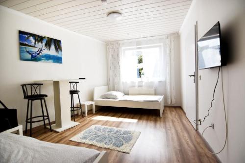 Ένα ή περισσότερα κρεβάτια σε δωμάτιο στο cozy worker apartments Niederkassel