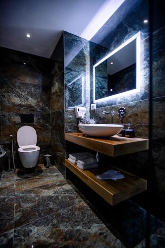 Salle de bains dans l'établissement Hotel Olsi