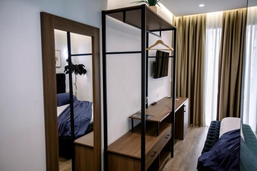 Un ou plusieurs lits dans un hébergement de l'établissement Hotel Olsi