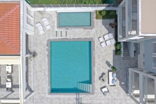 an overhead view of a swimming pool in a house at Sole Mare in Chrysi Ammoudia