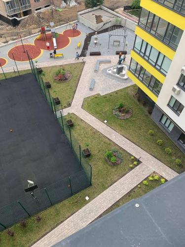 an aerial view of a park with a playground at Стильна чудова квартира в місті Тернопіль in Ternopilʼ