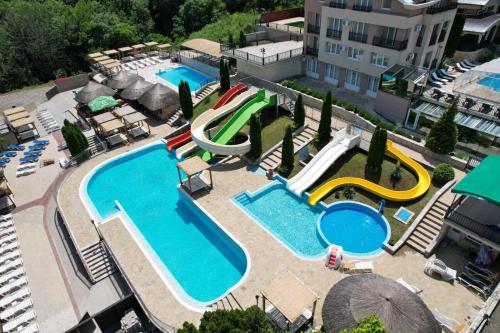 an overhead view of a pool with a water park at Vision apartmani Vrnjačka Banja in Vrnjci