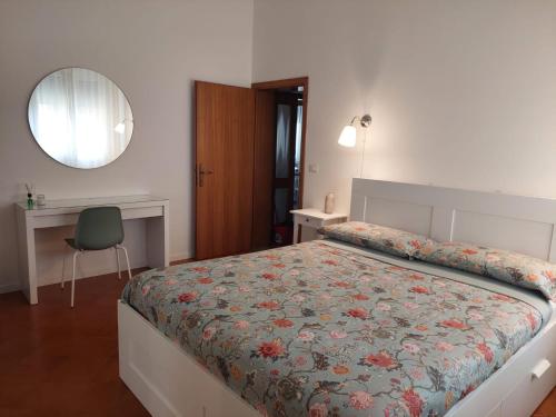 Un pat sau paturi într-o cameră la Casetta Mia - Holiday Family House