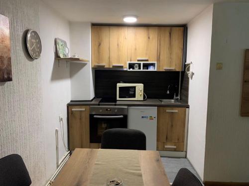 Kuchyň nebo kuchyňský kout v ubytování Apartman Kostadinovic