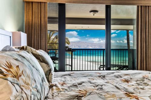 Ένα ή περισσότερα κρεβάτια σε δωμάτιο στο Noelani 309