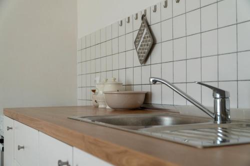a kitchen with a sink and a counter top at Milena Apartment Opatija in Volosko
