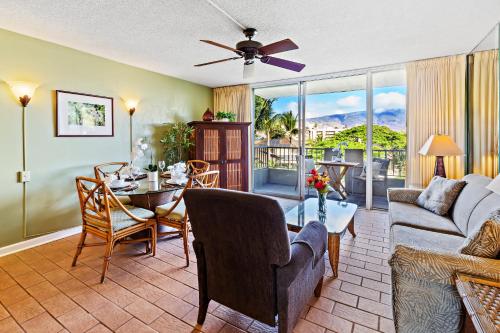 a living room with a couch and a table at Nani Kai Hale 404 in Kihei