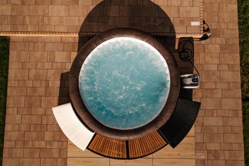 Ένα μπάνιο στο PANORAMA LASU komfortowe domy z jacuzzi Łeba-Nowęcin