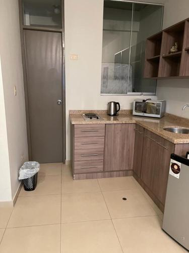 Η κουζίνα ή μικρή κουζίνα στο Apart-hotel Villakayro