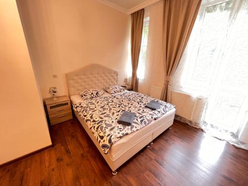 Postel nebo postele na pokoji v ubytování Jurincom apartments na Vyhlidce