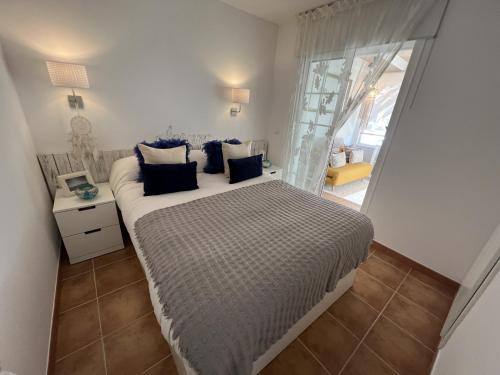 מיטה או מיטות בחדר ב-Casa Triana