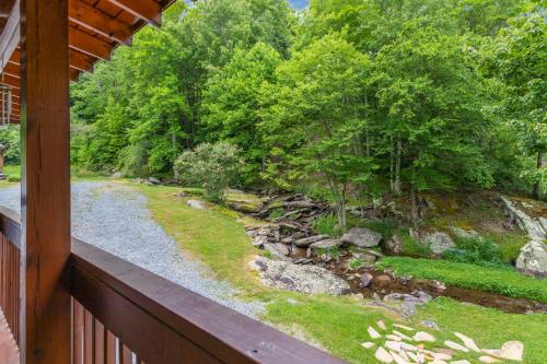 a view of a river from a porch of a house at Eagle Ridge Creek in Banner Elk