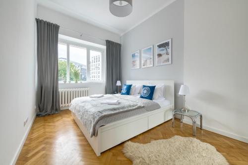 Krevet ili kreveti u jedinici u objektu Dom & House - Apartament Marina Portowa 3 Gdynia