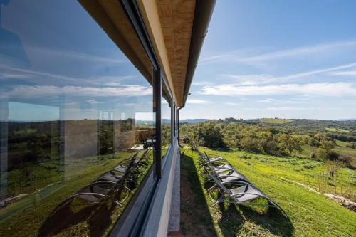 a view from the balcony of a house at Agriturismo La Meria in Semproniano