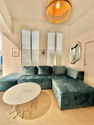 Un lugar para sentarse en Erholsame City-Erdgeschosswohnung mit Veranda, Grill und Parkplatz D46EG