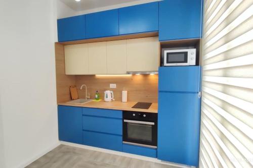 Η κουζίνα ή μικρή κουζίνα στο Apartments LORA Susanj #39