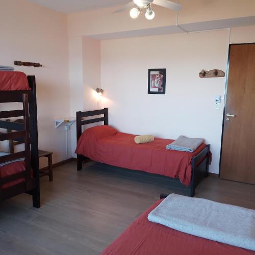 Ένα ή περισσότερα κρεβάτια σε δωμάτιο στο Hospedaje Penthouse 1004