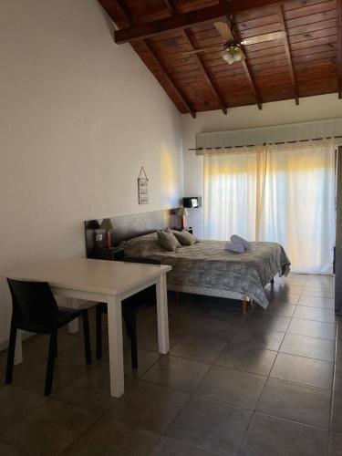 A bed or beds in a room at Complejo San Cristobal