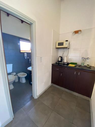 A kitchen or kitchenette at Complejo San Cristobal