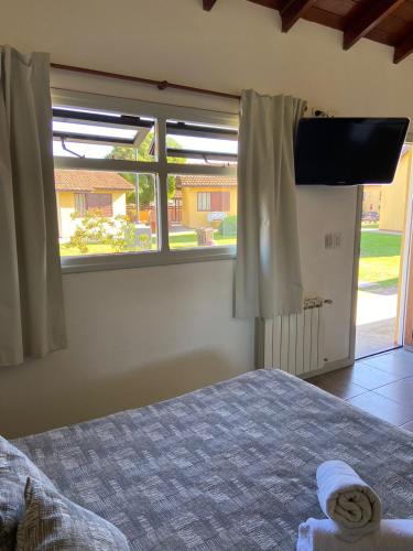 Llit o llits en una habitació de Complejo San Cristobal