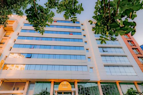 an office building with a lot of windows at Premiere Classe Casablanca Centre Ville in Casablanca