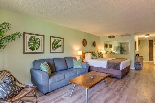 a hotel room with a bed and a couch at Maui Kaanapali Villas #B143 condo in Lahaina