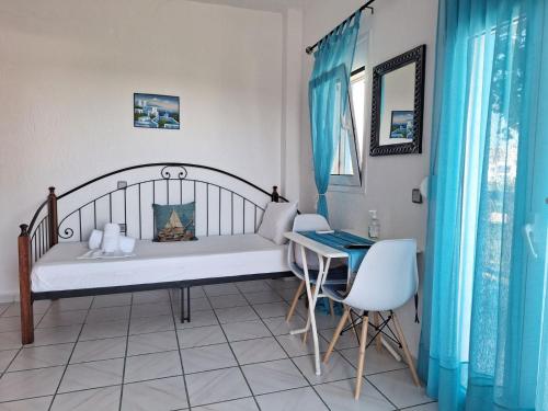 Postel nebo postele na pokoji v ubytování Βig Βlue Apartments