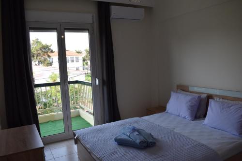 Postel nebo postele na pokoji v ubytování Absolute Apartment