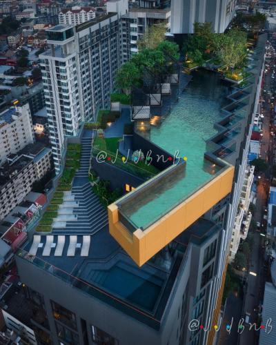 a swimming pool on the roof of a building at Edge Central Pattaya by JJJ in Pattaya Central